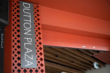 Pillar at Dutton Plaza featuring Dutton Plaza sign