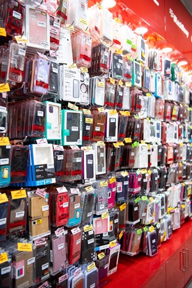 Shelf space displaying various mobile phone cases at Cabramatta Phones in Dutton Plaza