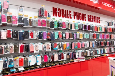 Shelf space with various mobile phone covers at GB Luxury in Dutton Plaza