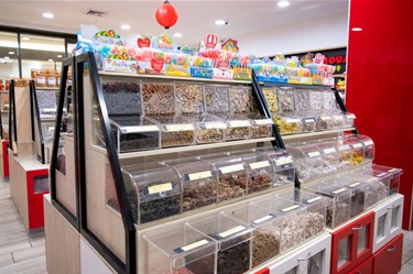 Various snack food containers at Jerky House in Dutton Plaza