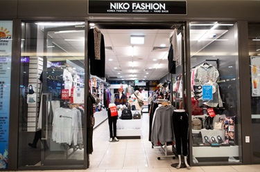 Entrance to Niko Fashion at Dutton Plaza