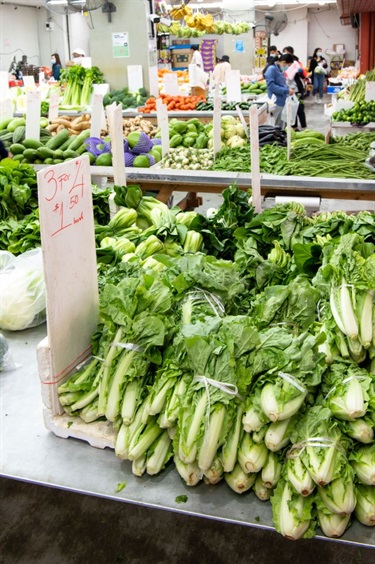 Shop aisles filled with fruit and vegetables inside Number One Fruit Shop at Dutton Plaza