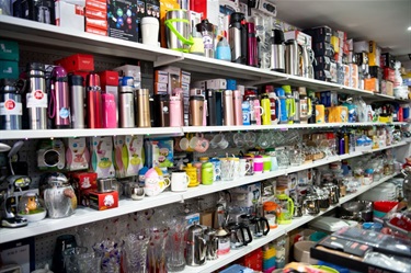 Various kitchenware available at Senselected Trading in Dutton Plaza, such as thermal water bottles, mugs, baby cups and teapots