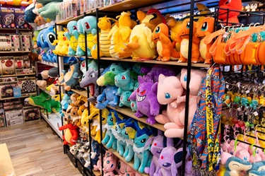 Shelves displaying Pokemon and Disney plush toys at Sydney Morning Glory in Dutton Plaza