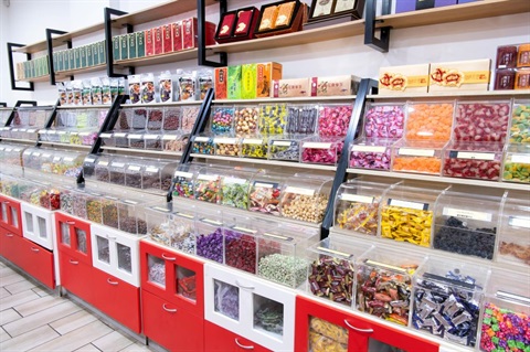 Self service food containers at Jerky House in Dutton Plaza featuring various types of confectionery