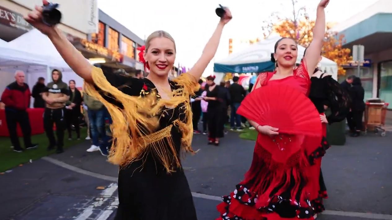 Two female dancers performing in the street